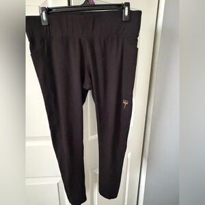 Sleek Black Leggings with Gold Accent